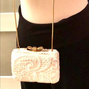 Franchi satin and lace clutch for anytime use
